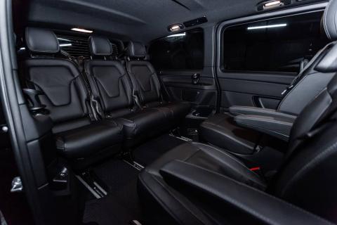 Black leather passenger cabin of a Mercedes-Benz V-Class used for secure airport transfers in Cape Town